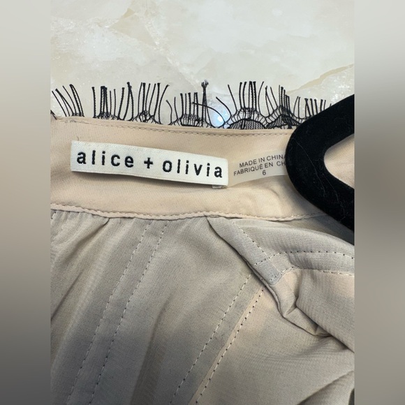 Alice + Olivia Black Lace Blouse. Like New!
Simply beautiful - Picture 7 of 7